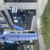 Custom 10 foot feather flag. (We also did the blade sign on the wall)